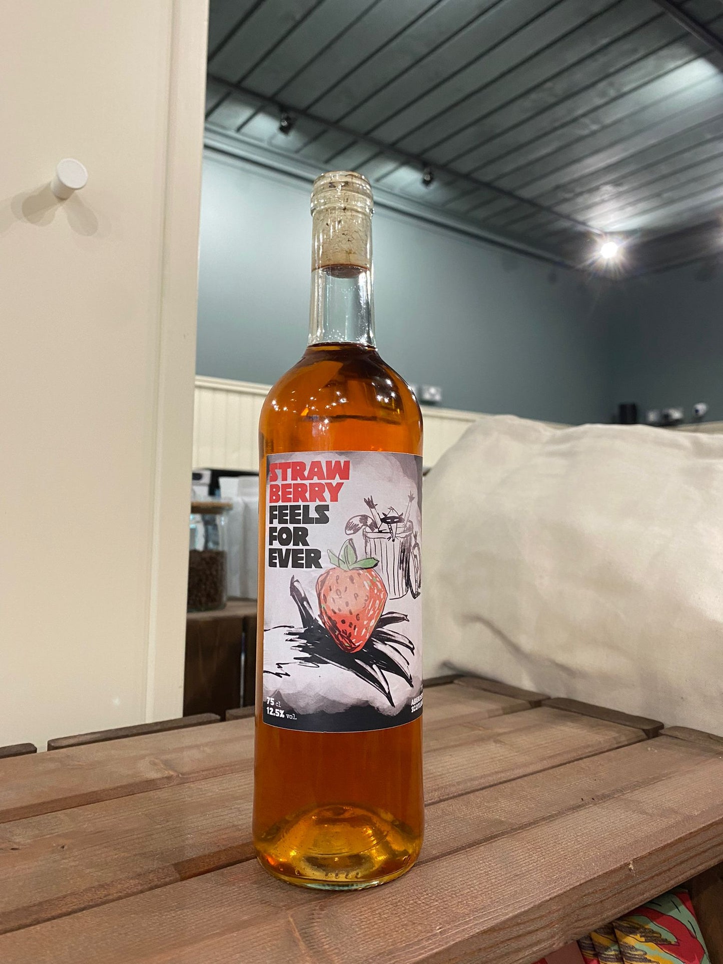 Two raccoons strawberry wine
